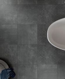 Lo sguardo di pietra del cemento nero di colore piastrella la porcellana rustica per non le piastrelle per pavimento del bagno di slittamento